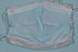 Figure 6a: Stretch out the mask fully. The inside of the mask is shown. Figure 6a: Stretch out the mask fully. The inside of the mask is shown.