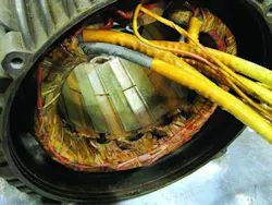 Figure 13. A 75 kW (100 hp), 5,000 rpm maximum, 12 pole SRM stator. Figure 13. A 75 kW (100 hp), 5,000 rpm maximum, 12 pole SRM stator.