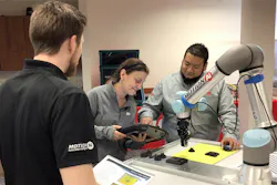 Figure 1. Engineers test pick-and-place cobot parameter settings in a laboratory. (Image courtesy of Motion Ai.) Figure 1. Engineers test pick-and-place cobot parameter settings in a laboratory. (Image courtesy of Motion Ai.)