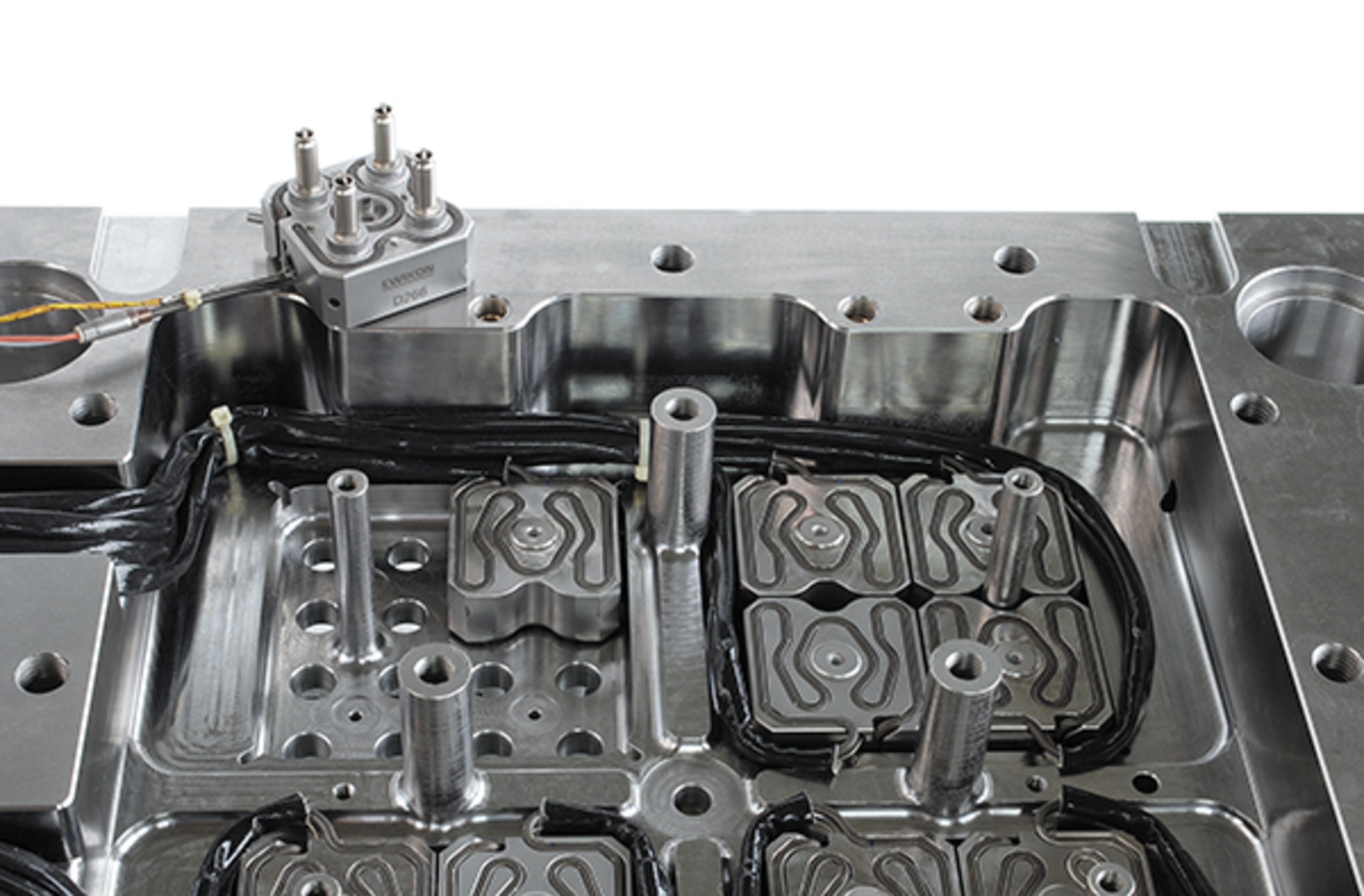 In Ewikon's 192-cavitiy tool, each micro-manifold acts as a single zone of temperature control to balance melt flow..