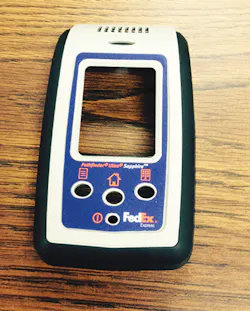 A molded panel for a FedEx barcode scanner. A molded panel for a FedEx barcode scanner.
