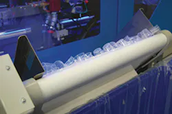 Dosing cups, bottom left, roll off the press. Dosing cups, bottom left, roll off the press.