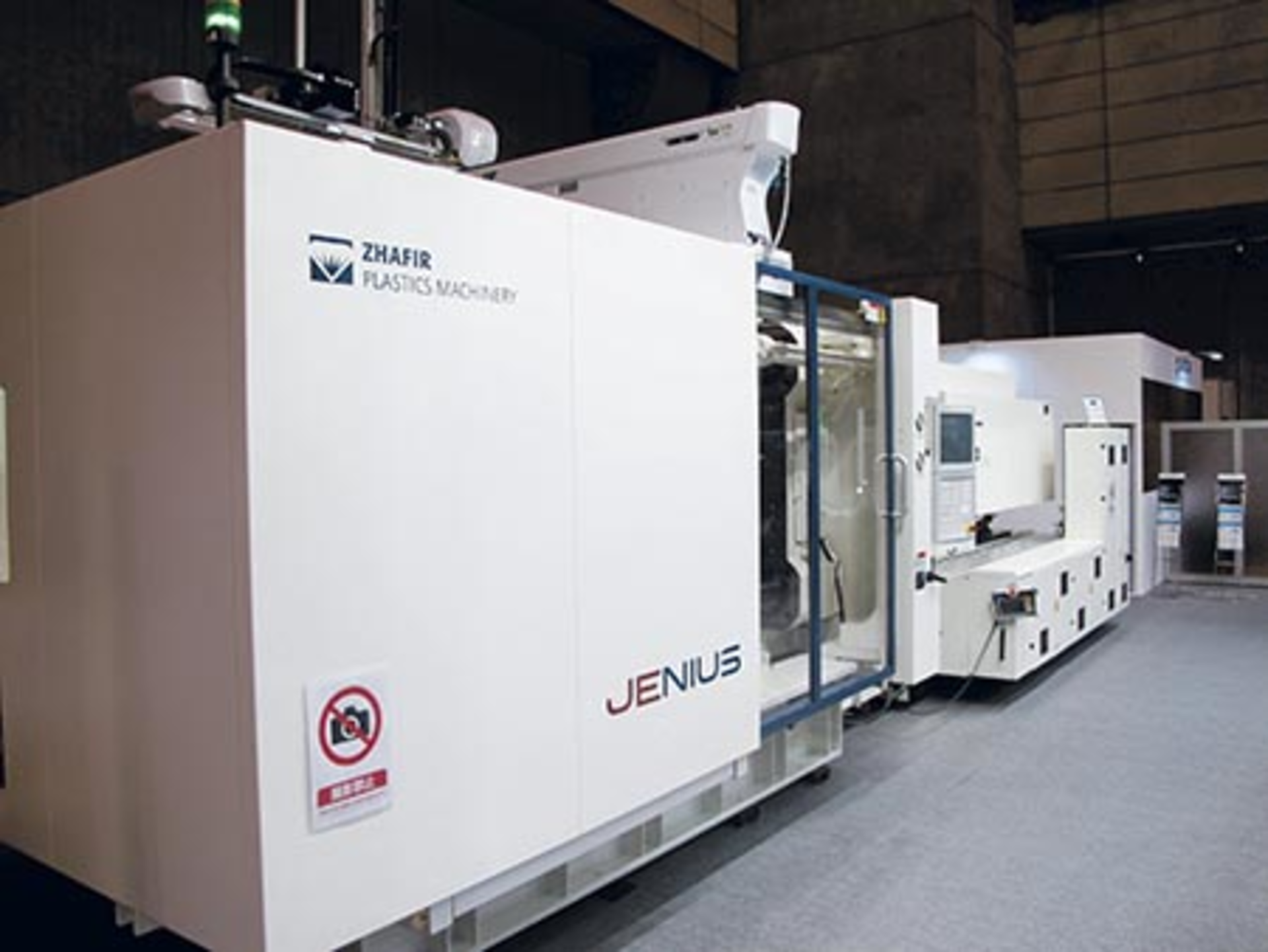 Haitian's new Jenius hybrid injection molding machines use two platens instead of a toggle clamp, which allows them to accommodate larger molds.