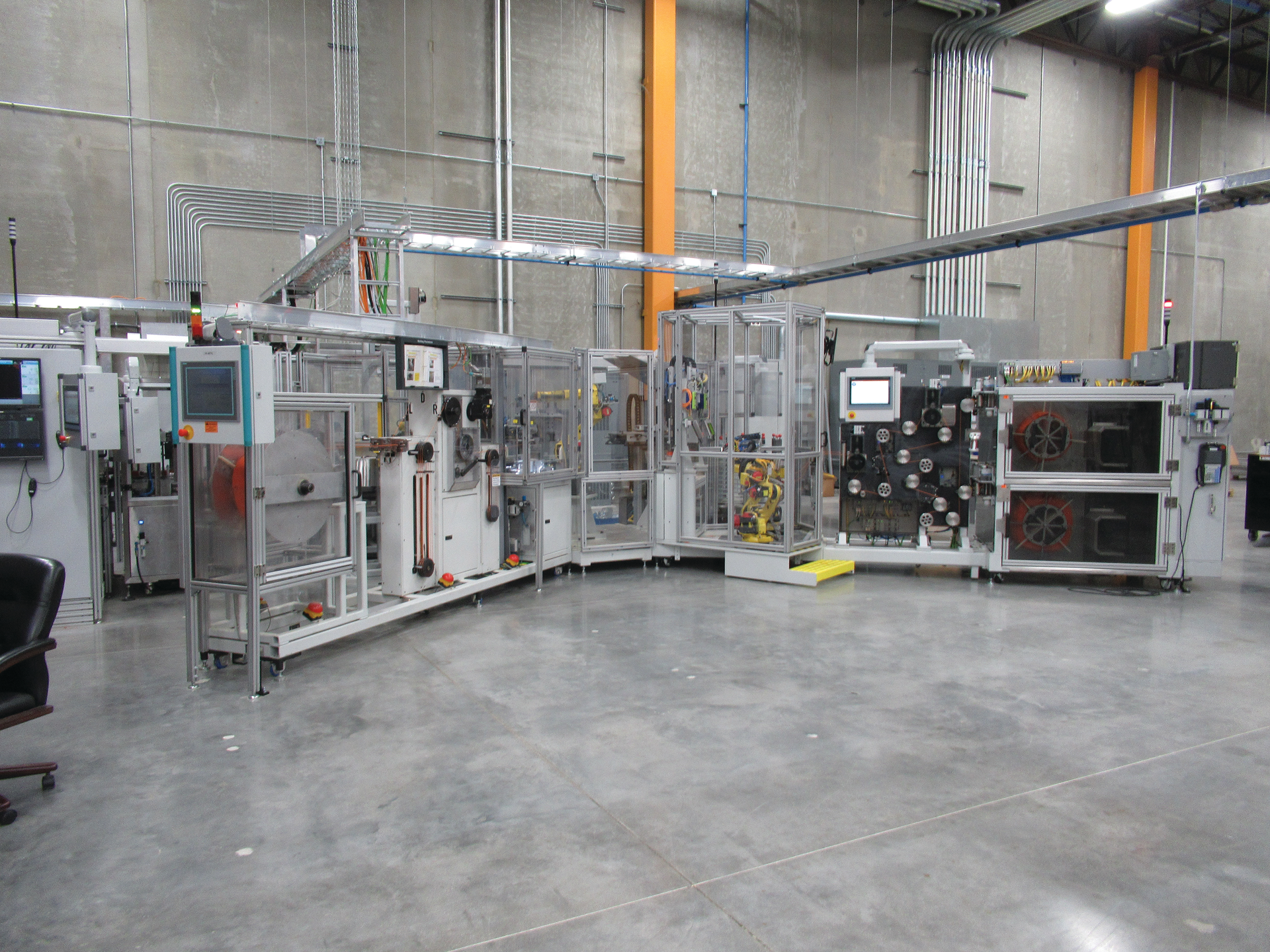 The Stihl team developed this complex winding cell to transfer 50-pound rolls of trimmer line to small packages for consumers.