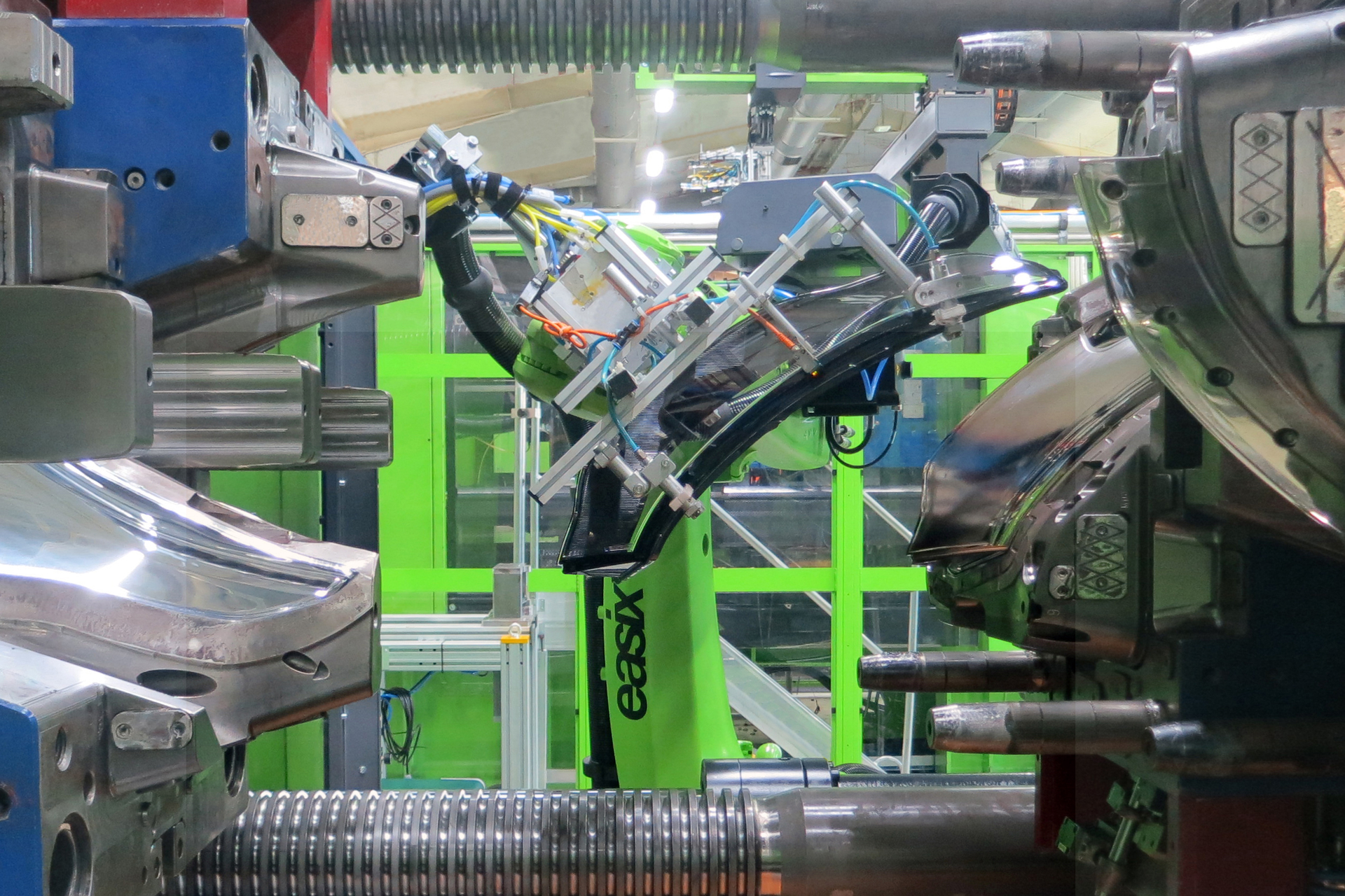 Engel machinery is used to produce vehicle headlight lenses.