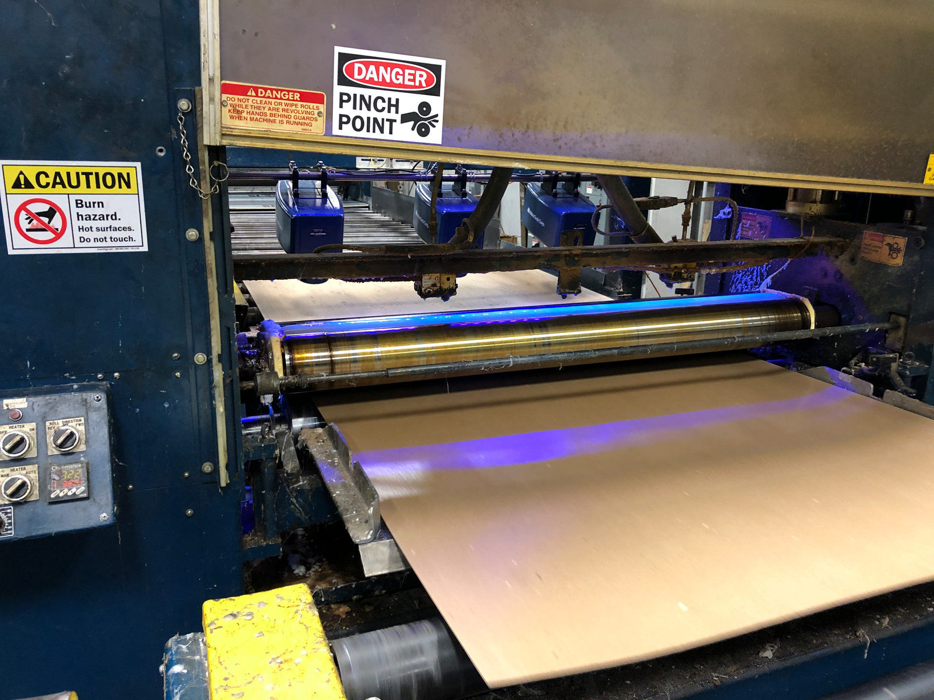 Three sensors on a linear belt slide system read the moisture levels and coating thickness of corrugated sheets. MoistTech is introducing the system to the plastics and converting industries this summer.