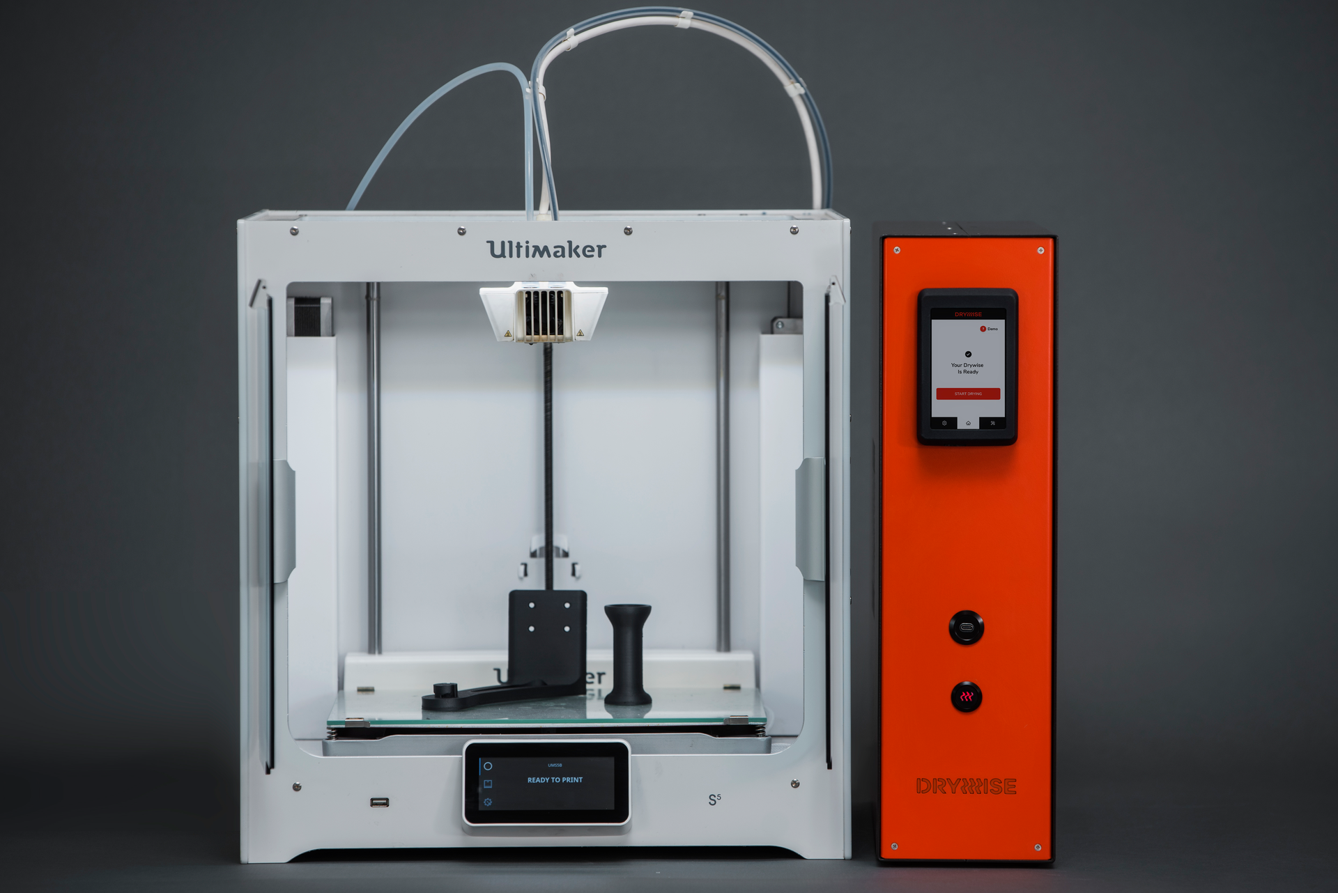 Drywise, shown here with an Ultimaker printer. continuously dries FDM filament during the 3D printing process.