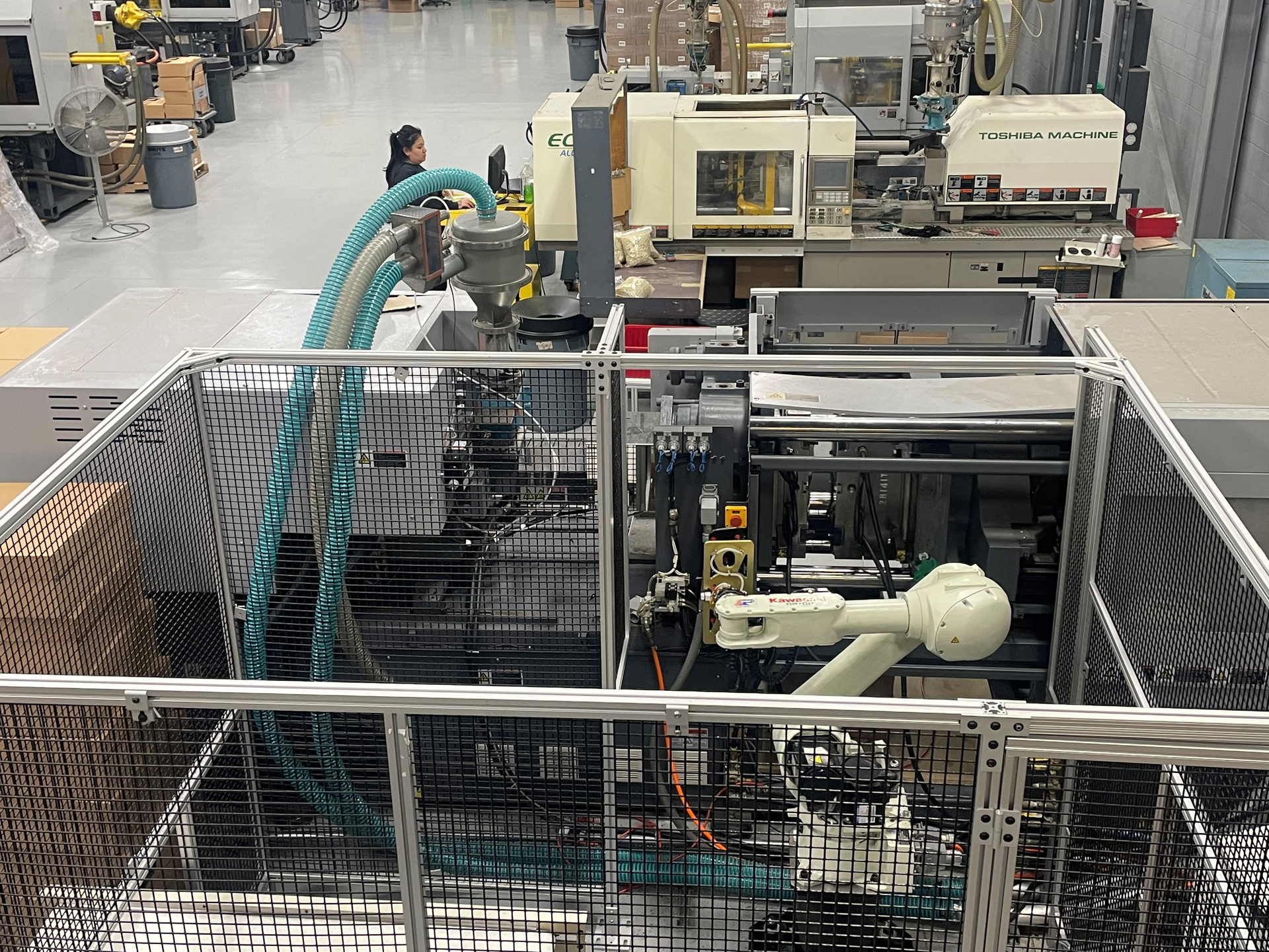 Champion Plastics, an injection molder that supplies the automotive, motorcycle and other industries, relies extensively on automation.