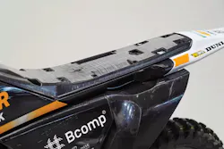 Using a new composite tape sandwich process, KTM Technologies and Engel Austria GmbH can produce motorcycle seat bases using less material and energy than traditional injection molding processes. Using a new composite tape sandwich process, KTM Technologies and Engel Austria GmbH can produce motorcycle seat bases using less material and energy than traditional injection molding processes.