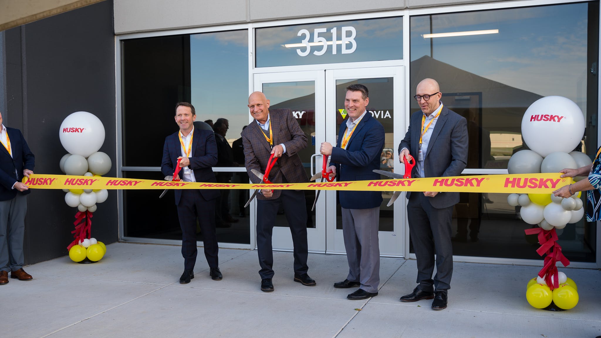 Husky Technologies held a ribbon-cutting ceremony to mark the opening of its new service center in Jeffersonville, Ind., on Nov. 30.