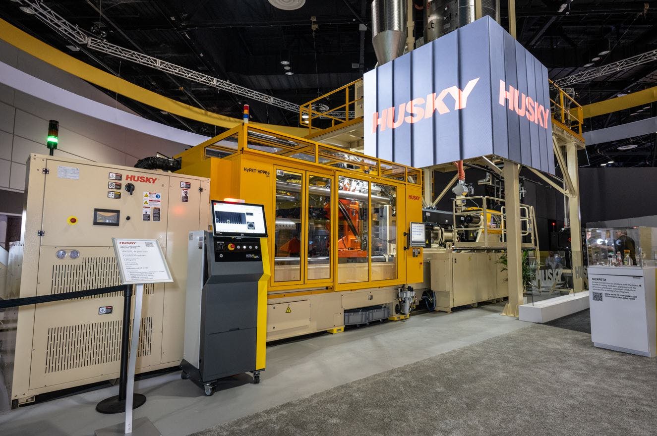 Husky's new HyPET6e injection molding machine worked alongside an integrated drying system to produce preforms comprised entirely of 100 percent recycled PET.