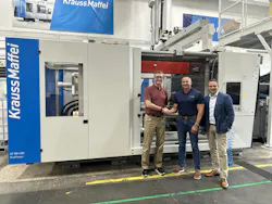 Nolan Strall, center, is handing over leadership of KraussMaffei Corp. to Brett Greenhalgh, left. Managing Director Jörg Stech is at right. Nolan Strall, center, is handing over leadership of KraussMaffei Corp. to Brett Greenhalgh, left. Managing Director Jörg Stech is at right.