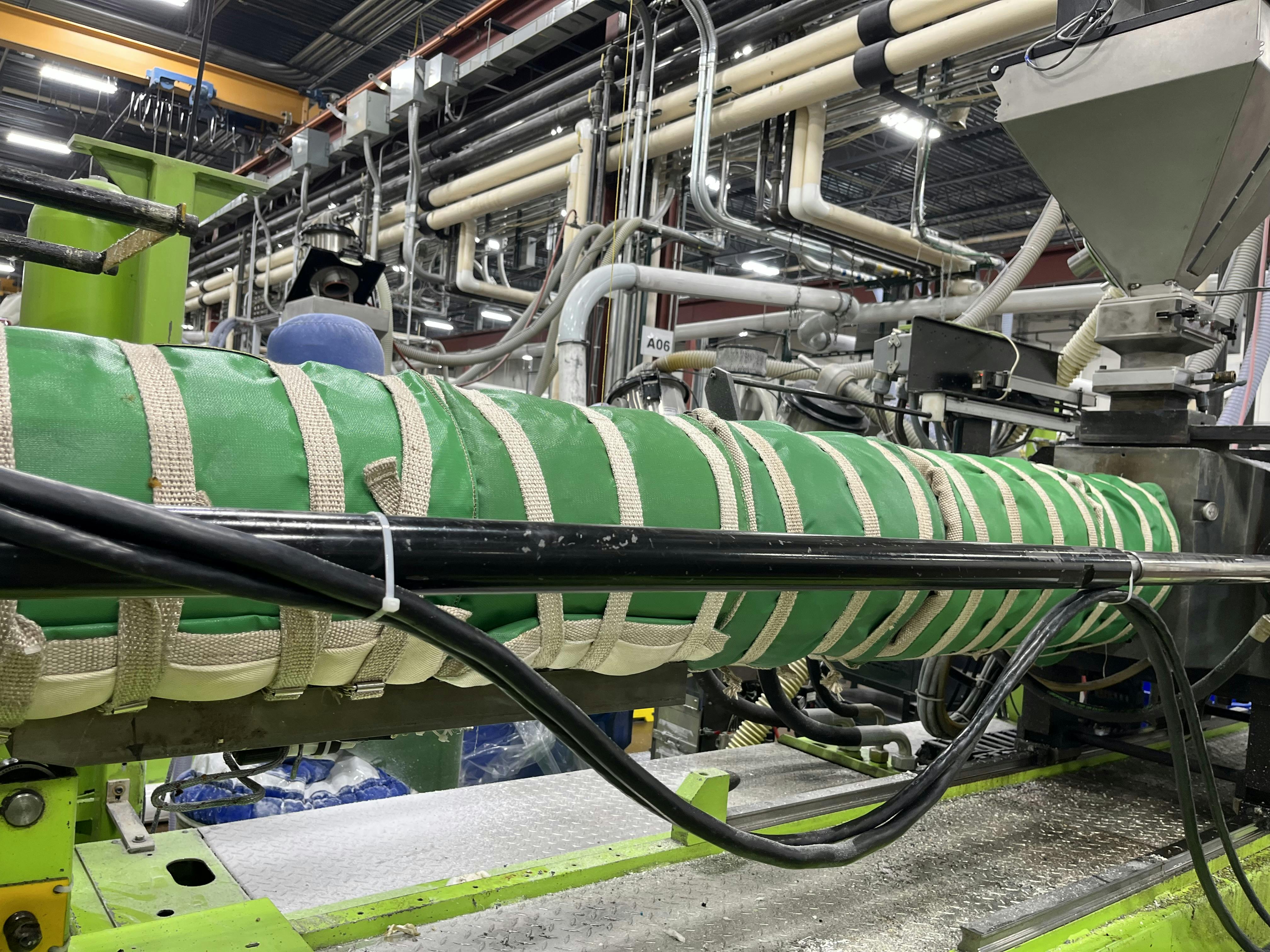 Wrapping insulation jacketing around injection molding machines is 'the most cost-effective thing I have ever seen,' APenergy consultant Matt Flanigan says.