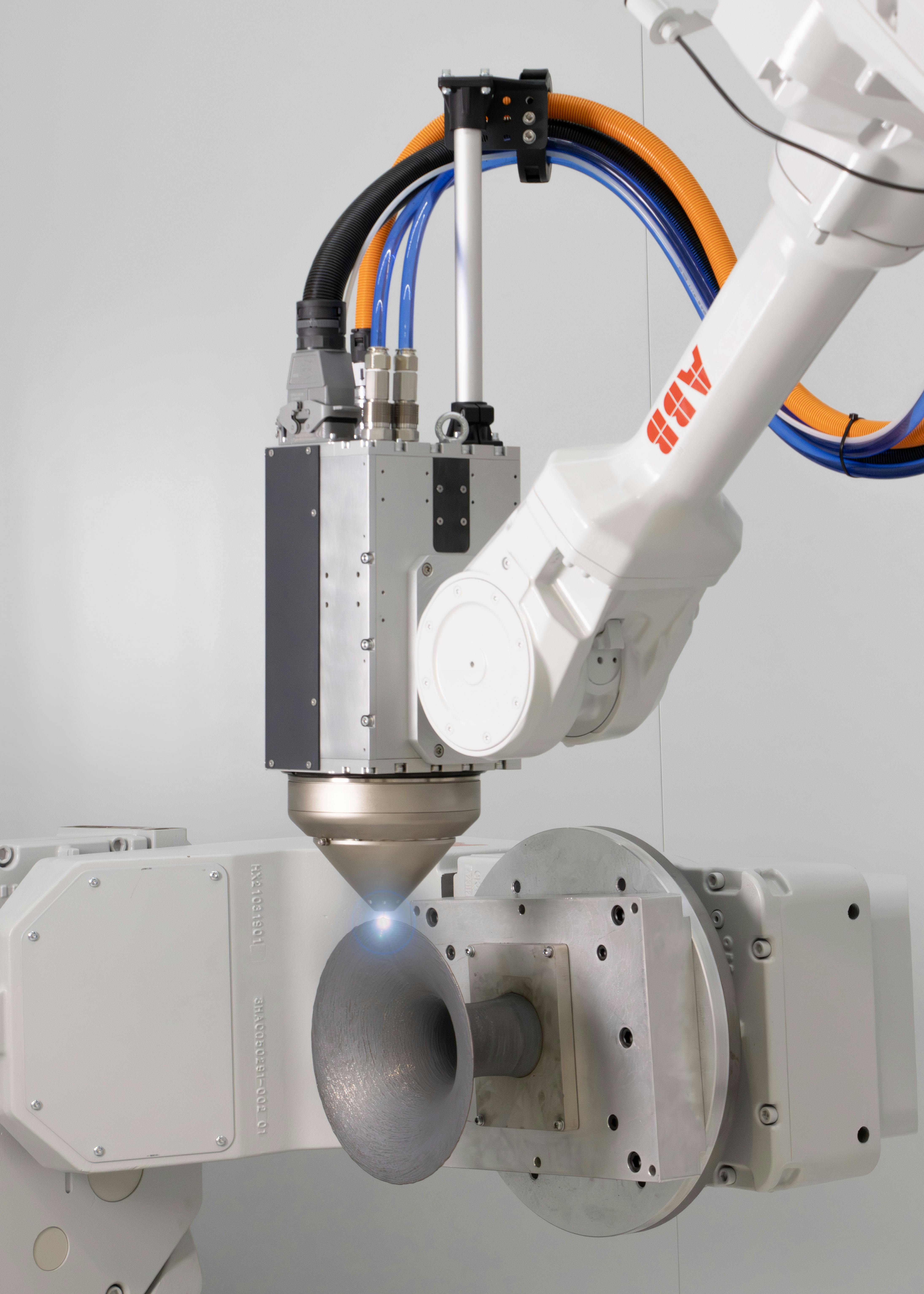 Meltio's Engine Blue kit integrates a 3D metal print head onto an industrial robot.