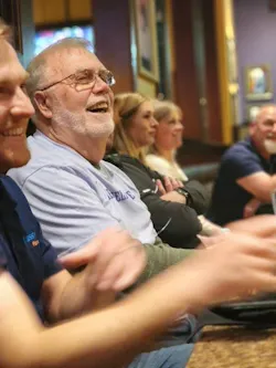 Artie Riegger, regional sales manager for extrusion for KraussMaffei Corp., shares a laugh with people at a restaurant last year in Florence, Ky., where the equipment manufacturer has its U.S. headquarters. Artie Riegger, regional sales manager for extrusion for KraussMaffei Corp., shares a laugh with people at a restaurant last year in Florence, Ky., where the equipment manufacturer has its U.S. headquarters.