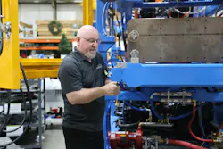 Jim Vezina, a lead assembly technician at Rocheleau Tool & Die, works on equipment at the family-owned shop. Established in 1938, the company has dealt with customers and suppliers that have merged, consolidated and broken apart as it's built its niche as a manufacturer of blow molding machines. Jim Vezina, a lead assembly technician at Rocheleau Tool & Die, works on equipment at the family-owned shop. Established in 1938, the company has dealt with customers and suppliers that have merged, consolidated and broken apart as it's built its niche as a manufacturer of blow molding machines.