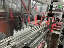 Dual-chamber bottles undergo visual inspection at Currier Plastics. Dual-chamber bottles undergo visual inspection at Currier Plastics.