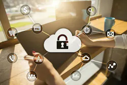 Woman's hands holding tablet overlaid with cybersecurity icons Woman's hands holding tablet overlaid with cybersecurity icons