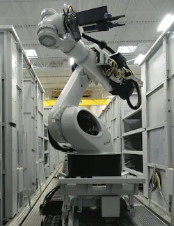 Seven-axis Kuka robot services three machining centers in the Hermle work cell. Seven-axis Kuka robot services three machining centers in the Hermle work cell.