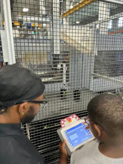 Molding Kids for Success program participants learn injection molding basics including how to operate a digital controller. Anthony Oliver, left, supervises a student’s lesson. Molding Kids for Success program participants learn injection molding basics including how to operate a digital controller. Anthony Oliver, left, supervises a student’s lesson.