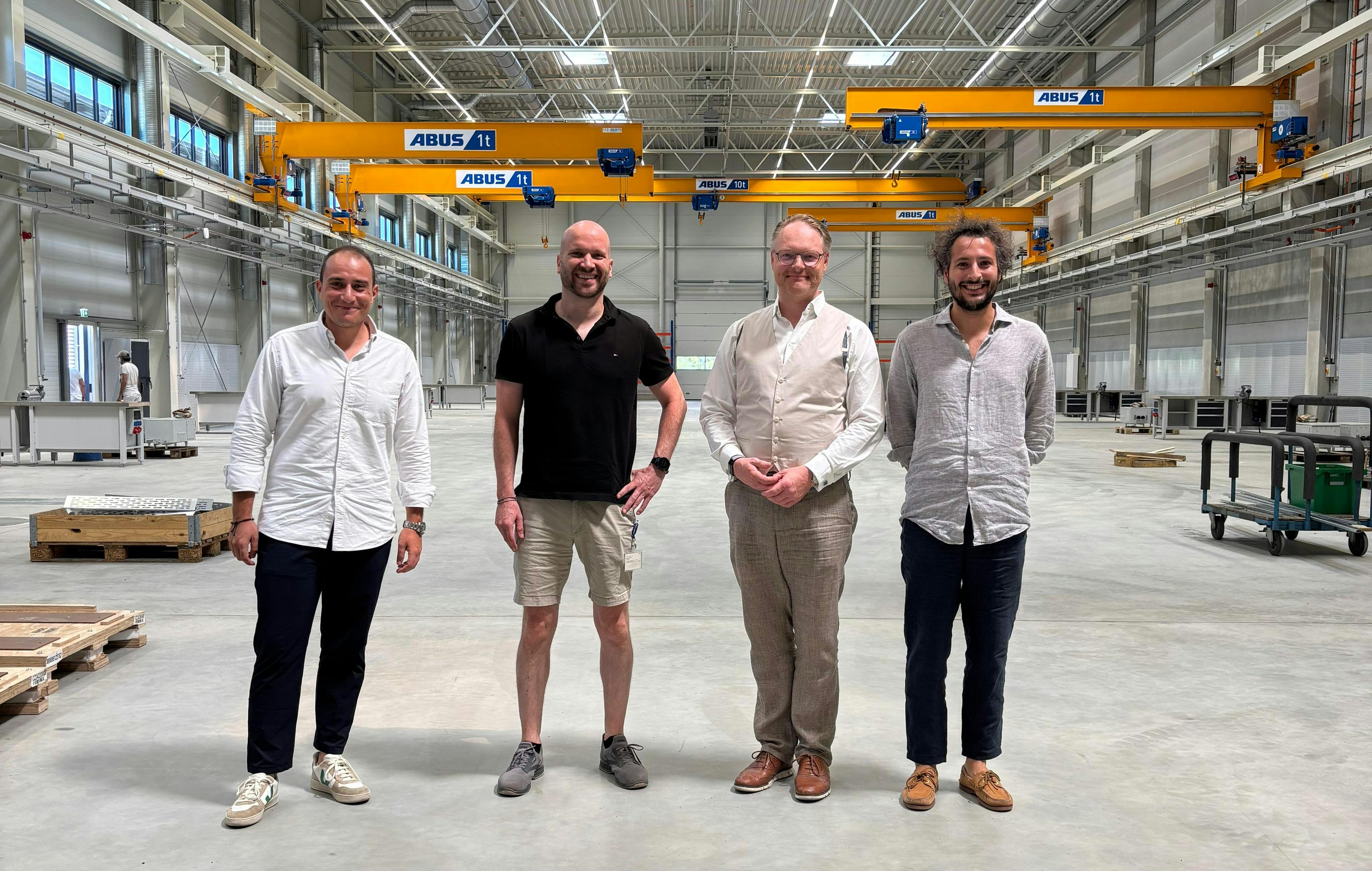 Caracol CEO Francesco De Stefano, Hans Weber managing directors Ludwig Weber and Markus Weber, and Caracol COO Paolo Cassis mark the acquisition of Hans Weber&rsquo;s additive division by Caracol.