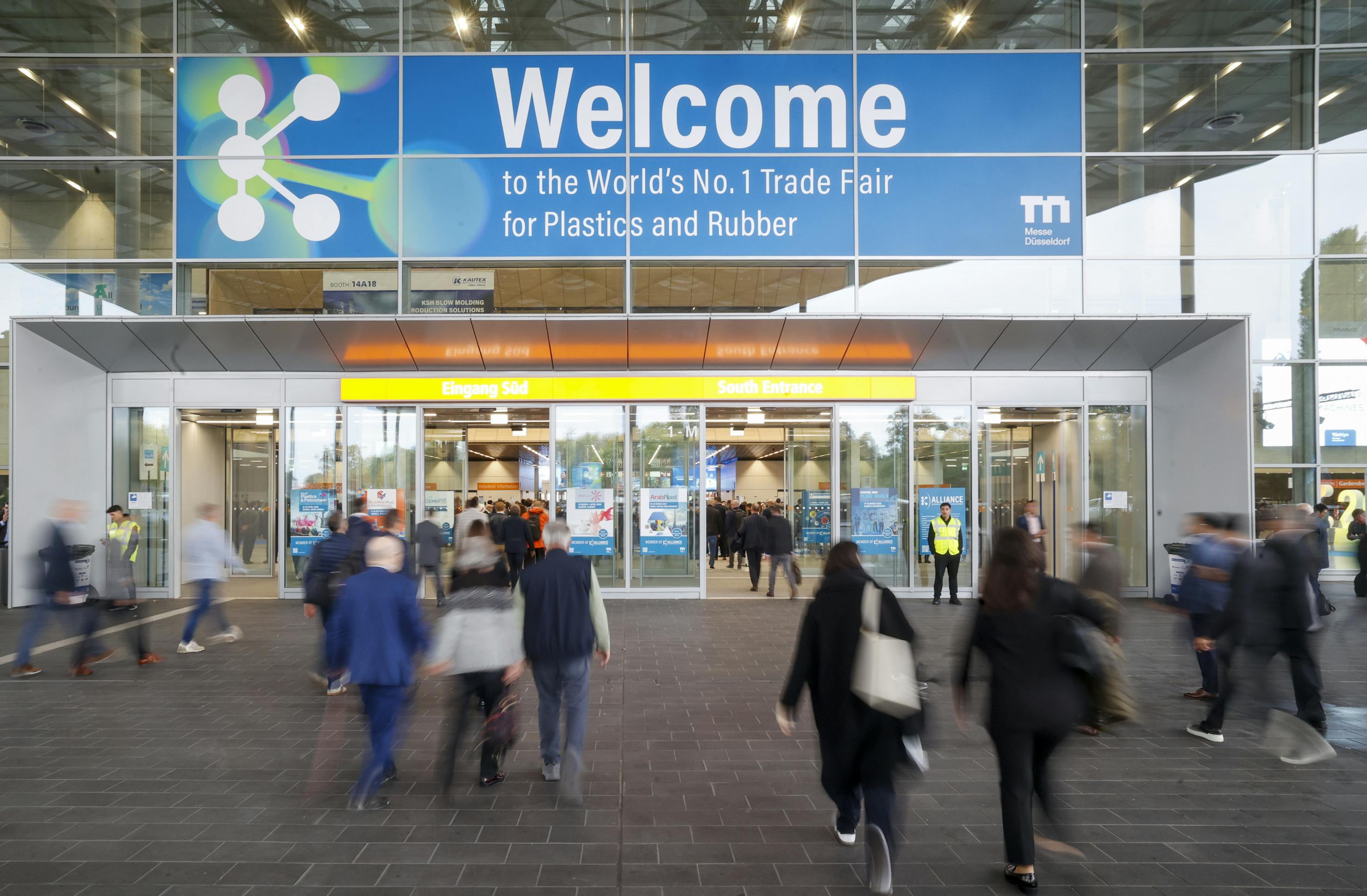 K 2025 attendees enter one of the trade fair's halls in D&uuml;sseldorf, Germany.
