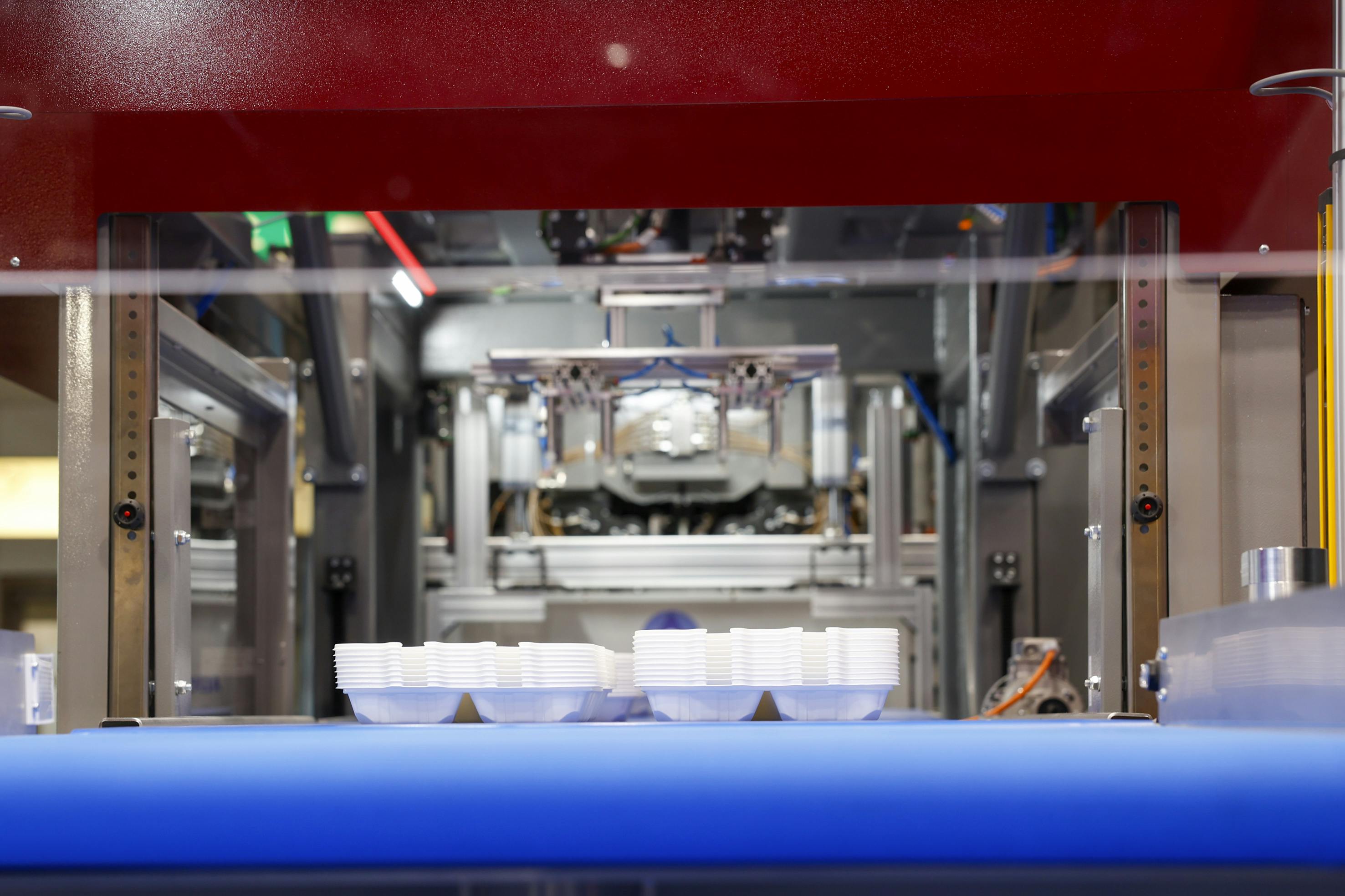 Trays on a demonstration line at K 2025.