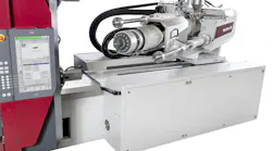 The pivotable injection unit on the new Wittmann MacroPower IMM. The pivotable injection unit on the new Wittmann MacroPower IMM.