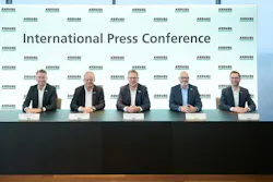 Five Arburg executives at a table for a press conference at Technology Days. Five Arburg executives at a table for a press conference at Technology Days.