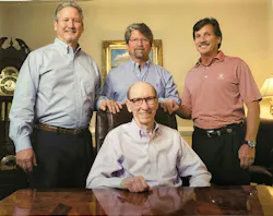 Charles Sewell sits in front of his sons, from left, John, Scott and Drew. Charles Sewell sits in front of his sons, from left, John, Scott and Drew.