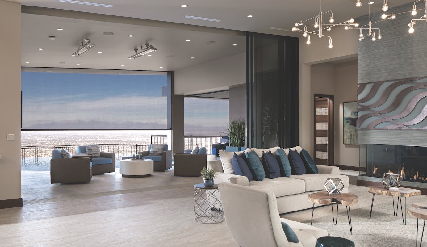 66fdba17de5fd1d077547f34 Newamericanhome2020livingroomviewouttodesertthroug