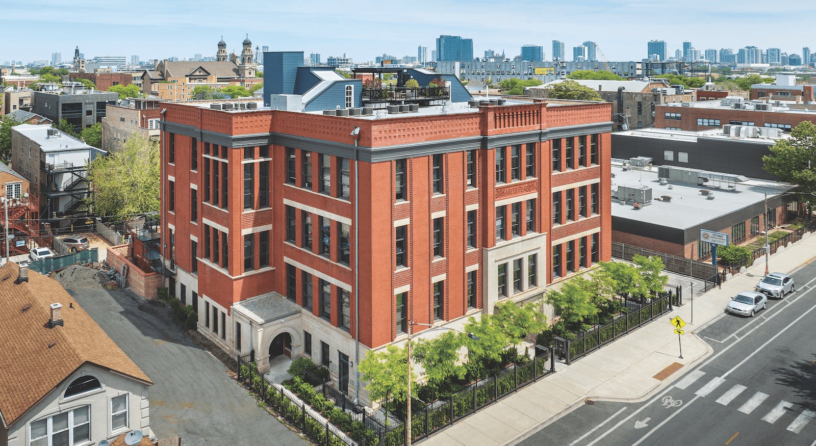 The Peabody School adaptive reuse project in Chicago converted the Elizabeth Peabody School, built in 1894, into 23 apartments