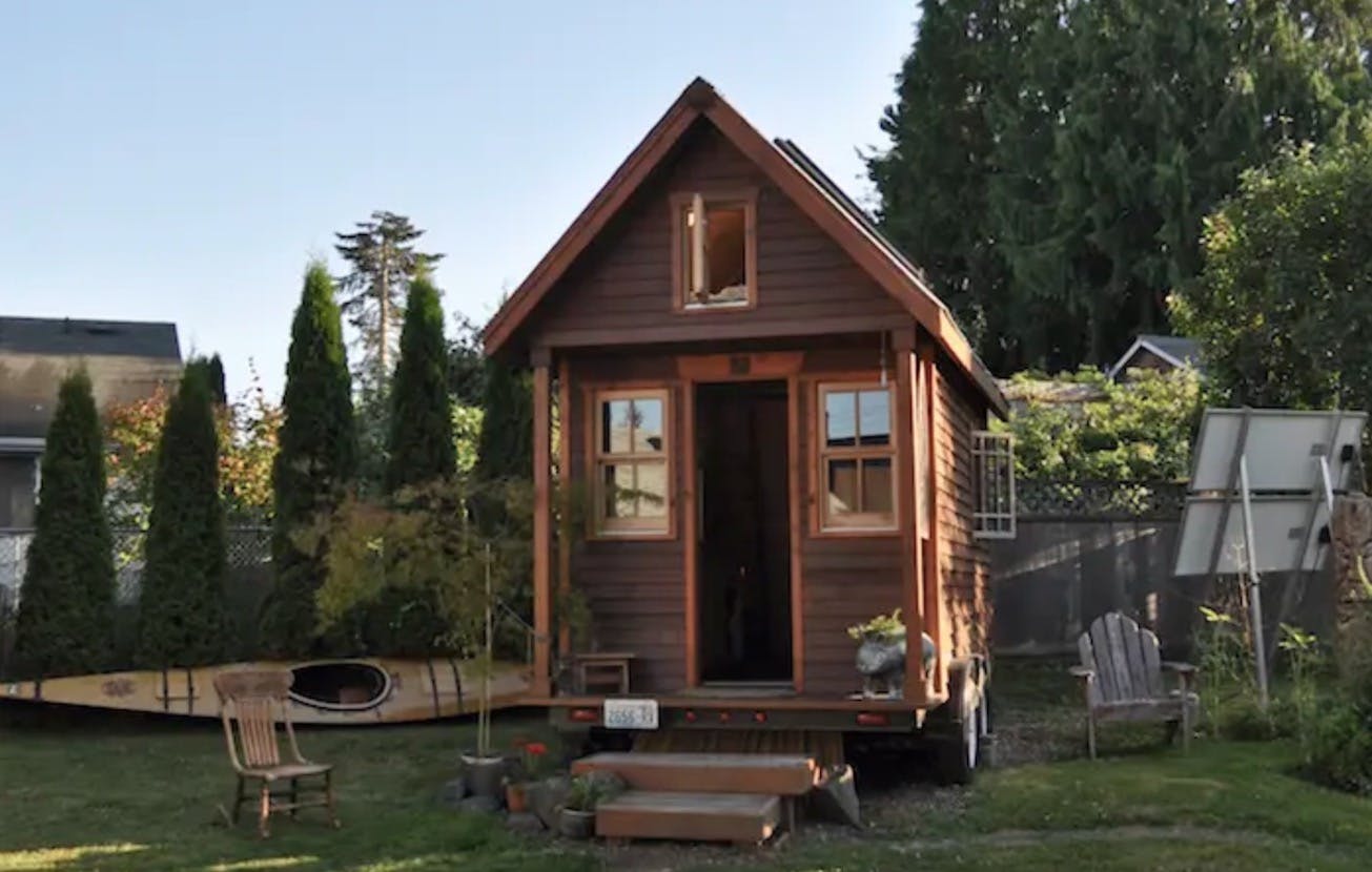 66fdbfabdbd68e54bd4aaa6c Tinyhousewithsurroundingtrees
