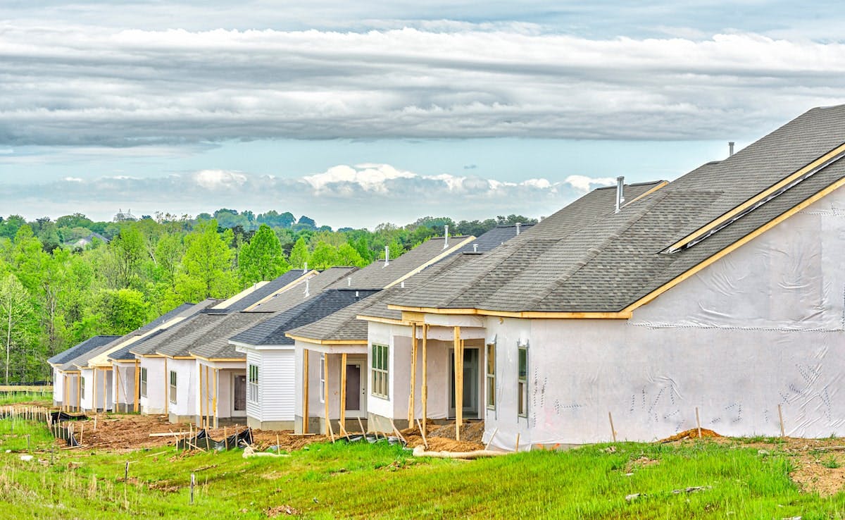 66fdc988d4ea3856dda5ad1c New20row20of20housesmin