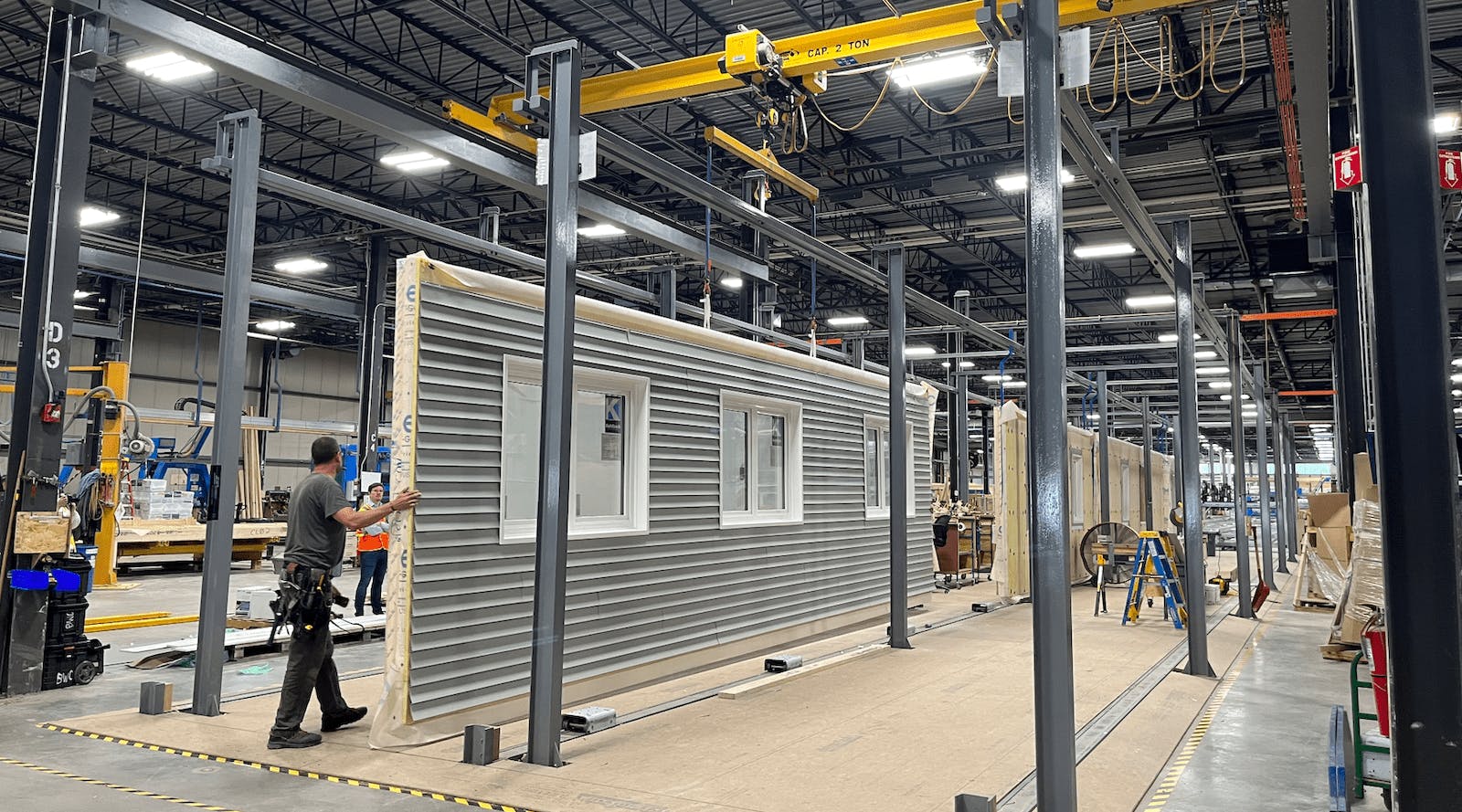Precision-built panels in a factory using off-site construction methods.