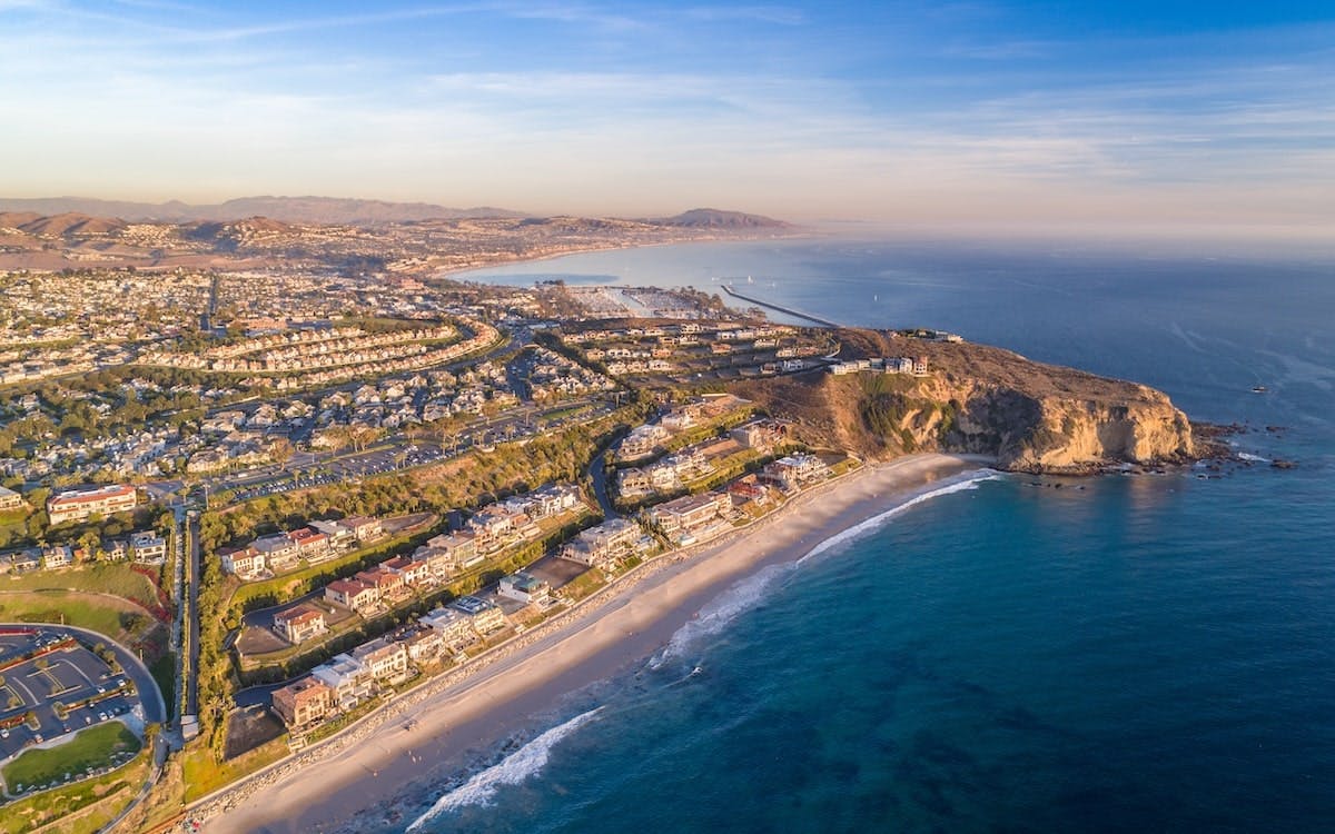 Cities, such as Dana Point, Calif., are losing value due to rising sea levels, erosion, and flooding.