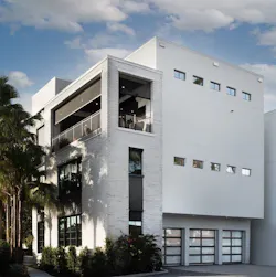 Rear elevation and garage of The New American Home 2021 Rear elevation and garage of The New American Home 2021