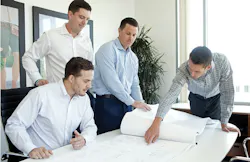 2019 Builder of the Year The New Home Company team at work reviewing plans 2019 Builder of the Year The New Home Company team at work reviewing plans
