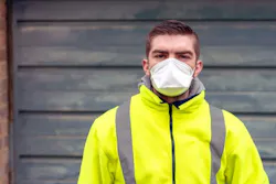 Young man with mask builder Young man with mask builder