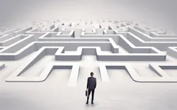 Man staring at a maze Man staring at a maze