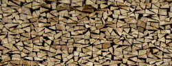 stacked firewood for burning in a fireplace stacked firewood for burning in a fireplace
