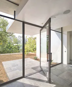 Hope's Windows' Jamestown175 pivot door is hurricane-rated Hope's Windows' Jamestown175 pivot door is hurricane-rated