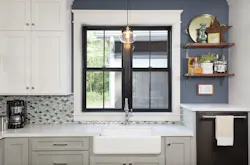 Craftsman-style home with blue hues in the kitchen Craftsman-style home with blue hues in the kitchen