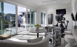 The New American Home 2022 lounge and fitness room The New American Home 2022 lounge and fitness room
