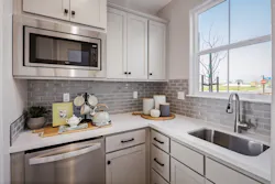 Signature Homes kitchen corner niche design in a multigenerational suite Signature Homes kitchen corner niche design in a multigenerational suite