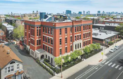 Exterior aerial view of Peabody School Apartments, an adaptive reuse project in Chicago and 2023 BALA winner Exterior aerial view of Peabody School Apartments, an adaptive reuse project in Chicago and 2023 BALA winner