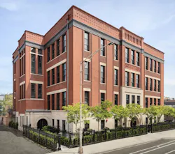 Exterior view of Peabody School Apartments, an adaptive reuse project in Chicago and a 2023 BALA winner Exterior view of Peabody School Apartments, an adaptive reuse project in Chicago and a 2023 BALA winner