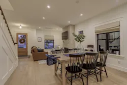 Living and dining rooms in open-plan home Living and dining rooms in open-plan home