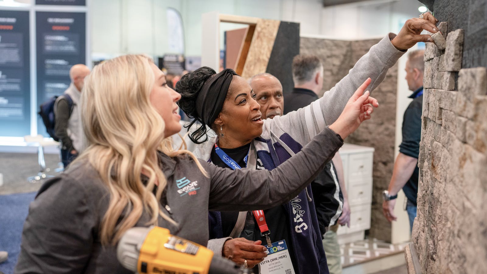 Product demonstrations on the show floor at the International Builders' Show.