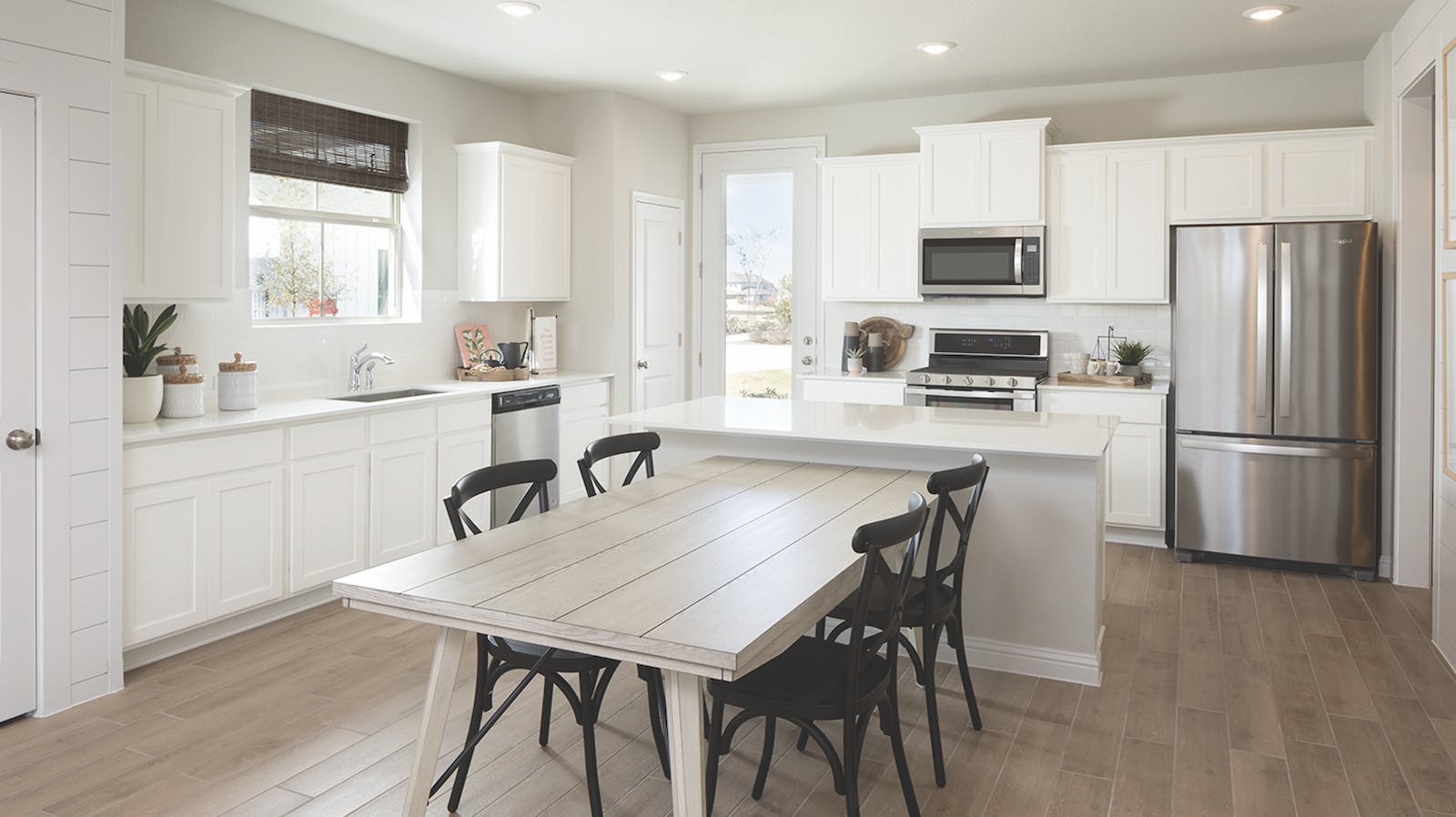 Courtyard Homes at Easton Park kitchen with island seating